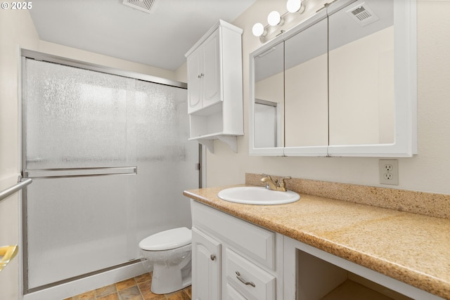 713 Brookside Cir, Rogue River, OR 97537 - full bathroom with a shower stall, vanity, and stone finish flooring