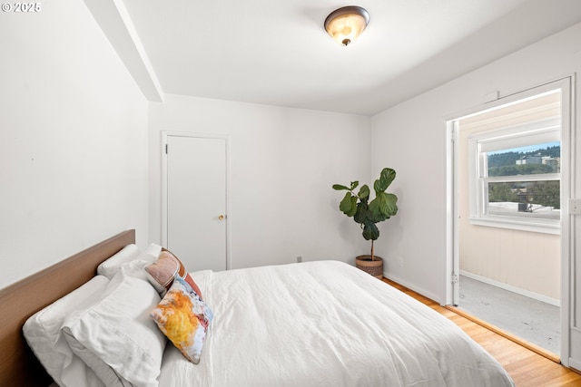 bedroom featuring hardwood / wood-style floors