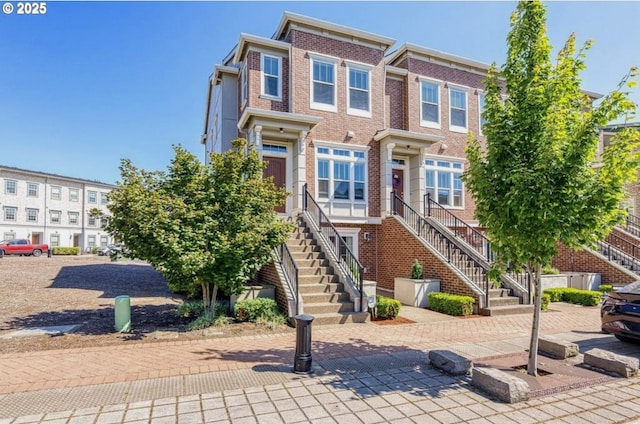 11469 SW Mont Blanc St, Wilsonville, OR 97070 - view of property featuring stairs and brick siding