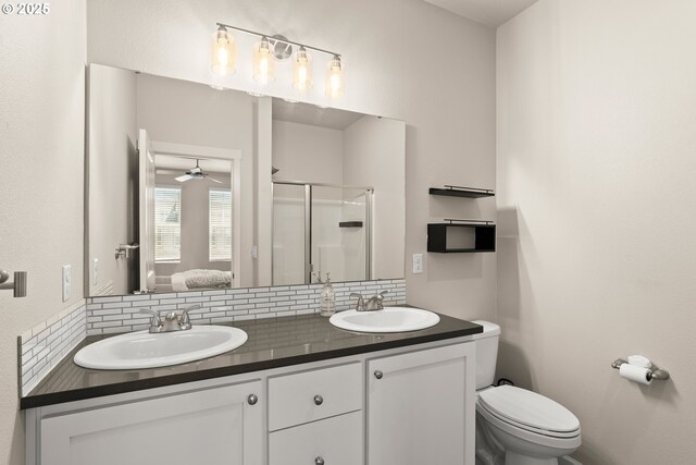 11469 SW Mont Blanc St, Wilsonville, OR 97070 - full bath featuring decorative backsplash, a stall shower, double vanity, and ceiling fan