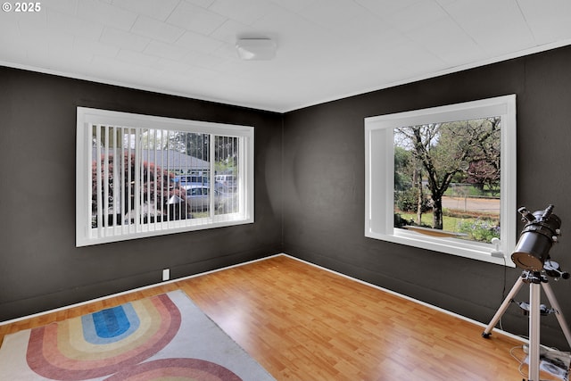 8011 SE Lambert St, Portland, OR 97206 - spare room with a wealth of natural light and wood finished floors