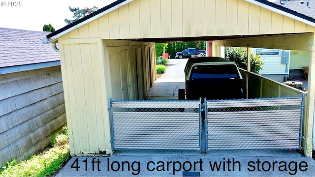8011 SE Lambert St, Portland, OR 97206 - exterior space with fence, a carport, and a shed