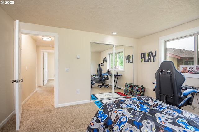 1193 Cedar Pl, Creswell, OR 97426 - carpeted bedroom featuring a closet, a desk, and a textured ceiling