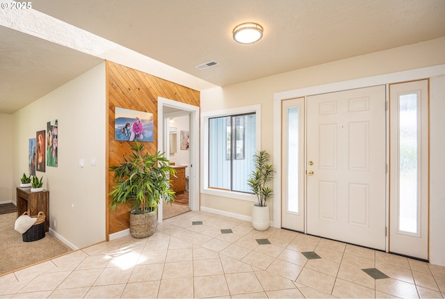 1193 Cedar Pl, Creswell, OR 97426 - entryway with wooden walls and light tile patterned floors
