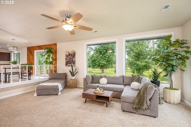 1193 Cedar Pl, Creswell, OR 97426 - living room featuring carpet, ceiling fan, and wooden walls