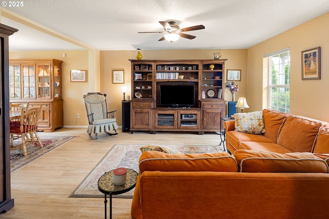 1190 Hazelnut Ct, Creswell, OR 97426 - living room featuring a ceiling fan and light wood finished floors