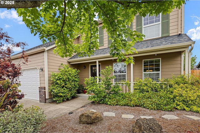 1190 Hazelnut Ct, Creswell, OR 97426 - traditional-style house with a porch and a garage