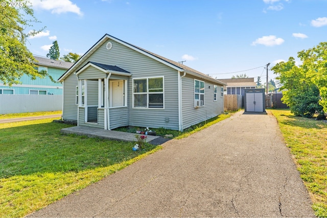 1483 5th St, Springfield, OR 97477 - view of front of house with a storage unit and driveway