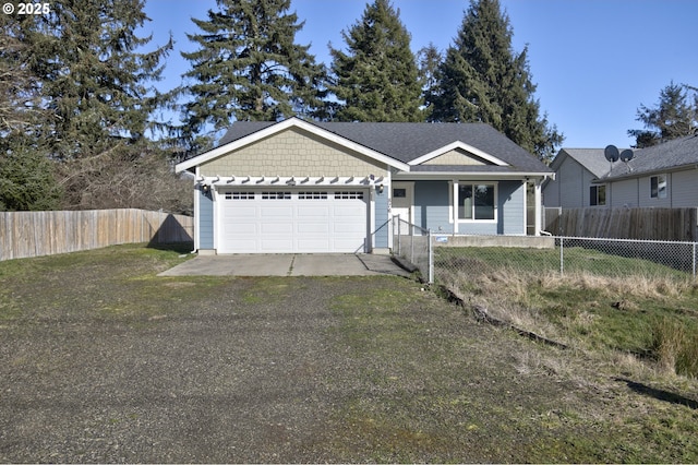 ranch-style house with driveway, roof with shingles, an attached garage, fence private yard, and a front lawn