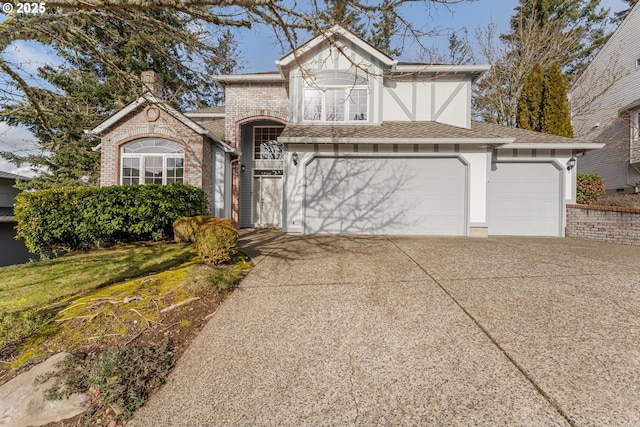 view of front of house featuring a garage and a front yard