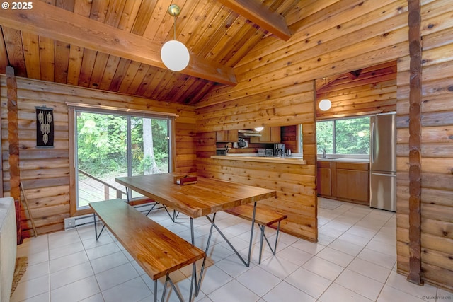 22190 E Lolo Pass Rd, Rhododendron, OR 97049 - dining space featuring rustic walls, wood ceiling, light tile patterned floors, and a baseboard heating unit