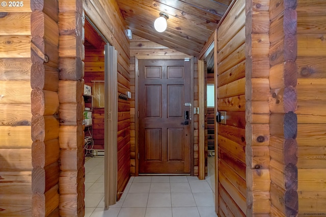 22190 E Lolo Pass Rd, Rhododendron, OR 97049 - doorway with vaulted ceiling, rustic walls, and light tile patterned floors