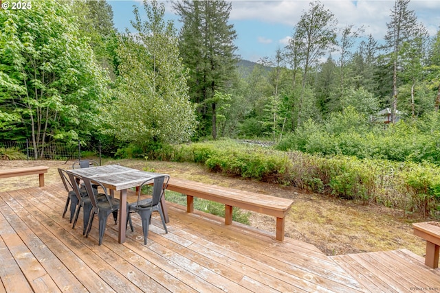 22190 E Lolo Pass Rd, Rhododendron, OR 97049 - wooden terrace featuring outdoor dining area and a forest view
