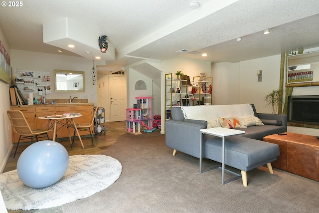 8302 SW 65th Ave, Portland, OR 97219 - living room with recessed lighting, carpet, and a textured ceiling