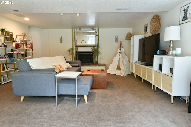 8302 SW 65th Ave, Portland, OR 97219 - carpeted living area featuring a textured ceiling, recessed lighting, and a fireplace with raised hearth