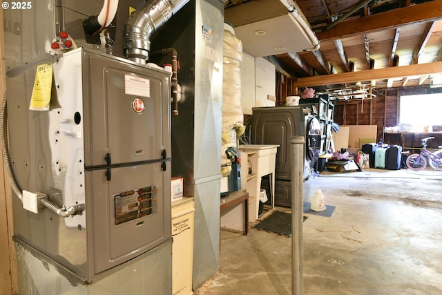 8302 SW 65th Ave, Portland, OR 97219 - utility room with heating unit