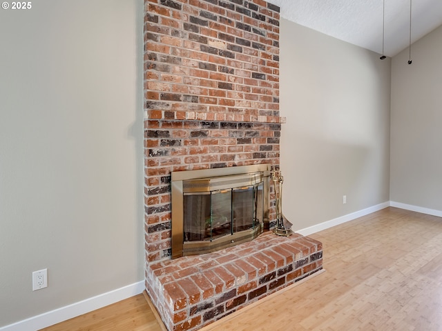 5367 NW 180th Pl, Portland, OR 97229 - detailed view of wood finished floors and a fireplace