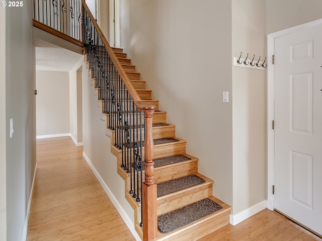 5367 NW 180th Pl, Portland, OR 97229 - stairs with wood finished floors and baseboards