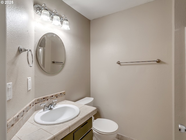 5367 NW 180th Pl, Portland, OR 97229 - bathroom featuring vanity and tasteful backsplash