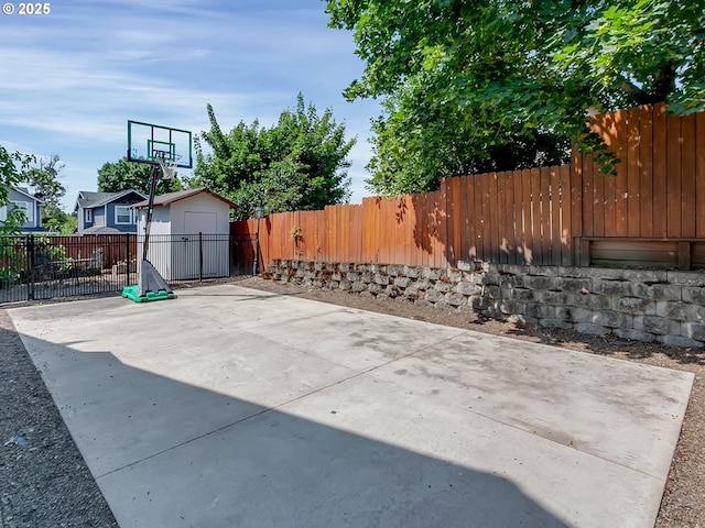 5367 NW 180th Pl, Portland, OR 97229 - fenced backyard with a storage shed and a patio