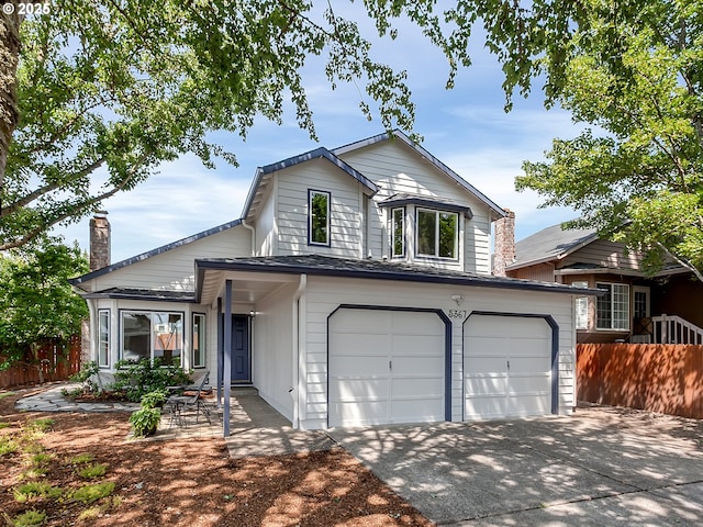 5367 NW 180th Pl, Portland, OR 97229 - view of front facade with a garage and driveway