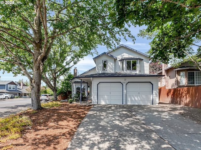 5367 NW 180th Pl, Portland, OR 97229 - traditional-style home with a garage and concrete driveway
