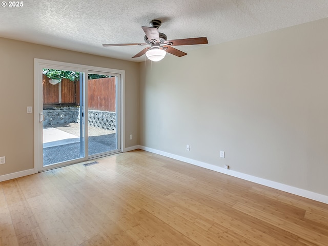 5367 NW 180th Pl, Portland, OR 97229 - unfurnished room with light wood-type flooring, ceiling fan, and a textured ceiling