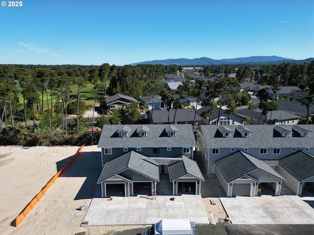 1577 37th St, Florence, OR 97439 - aerial perspective of suburban area with mountains