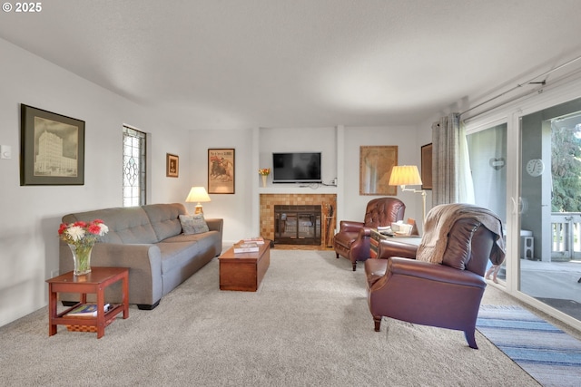 2062 Lake Isle Dr, Eugene, OR 97401 - living room with plenty of natural light, carpet, and a tile fireplace