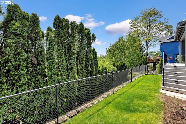 view of yard featuring a deck