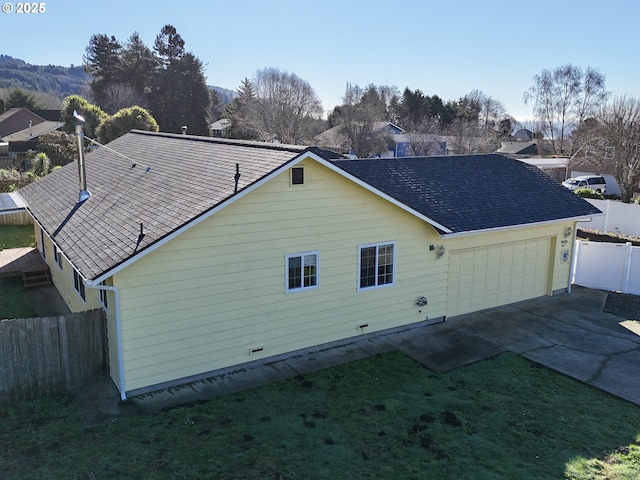 view of home's exterior featuring a garage