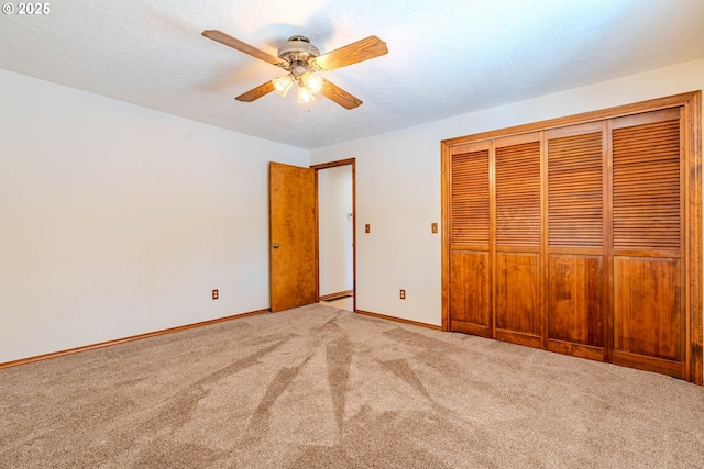 975 SW Florence Ct, Gresham, OR 97080 - unfurnished bedroom featuring carpet floors, a closet, baseboards, and ceiling fan