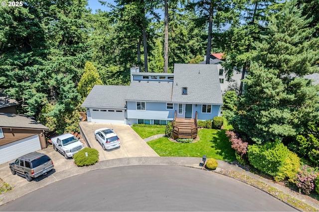 975 SW Florence Ct, Gresham, OR 97080 - view of front facade with a shingled roof and driveway