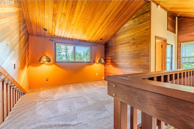 975 SW Florence Ct, Gresham, OR 97080 - carpeted spare room featuring wooden walls, wooden ceiling, vaulted ceiling, and plenty of natural light