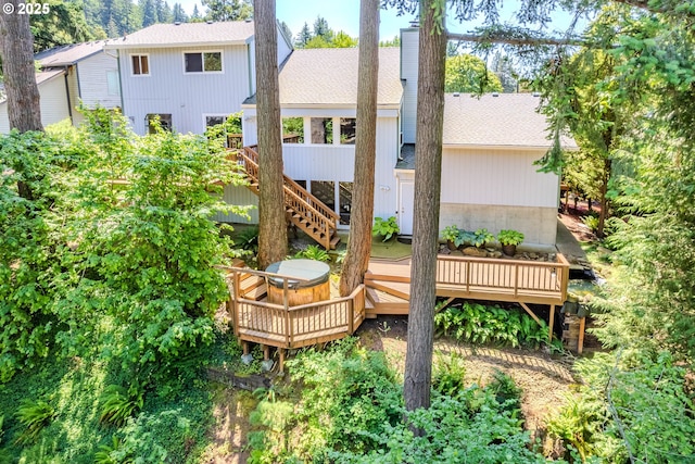 975 SW Florence Ct, Gresham, OR 97080 - rear view of property featuring a deck, a shingled roof, and stairs