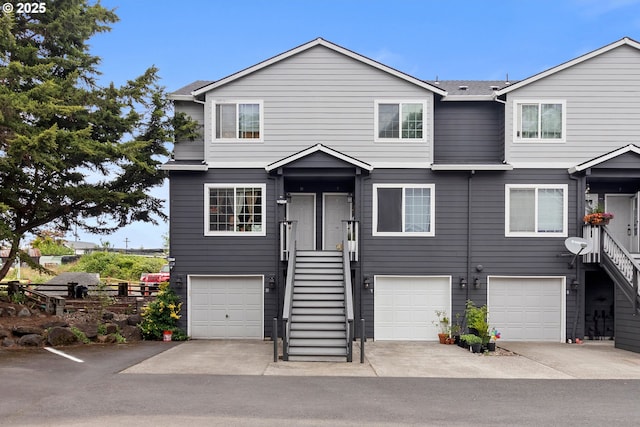 view of front of home with a garage and driveway
