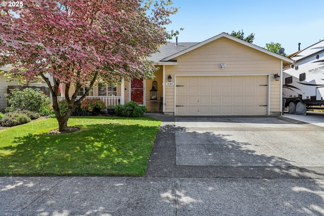 12703 NE 46th St, Vancouver, WA 98682 - view of front of home featuring a front yard, a garage, and driveway