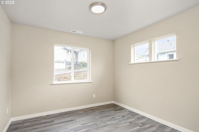 1516 Samuel Dr, Cottage Grove, OR 97424 - empty room with wood finished floors and baseboards