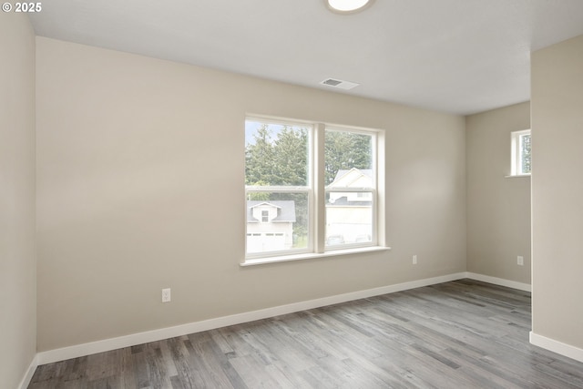 1516 Samuel Dr, Cottage Grove, OR 97424 - empty room featuring wood finished floors and baseboards