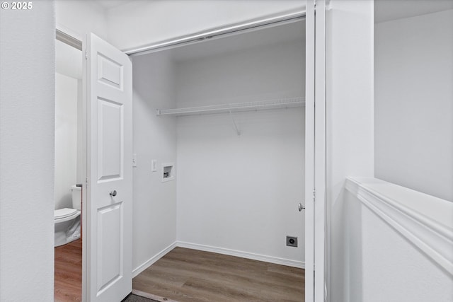 washroom featuring washer hookup and hardwood / wood-style flooring