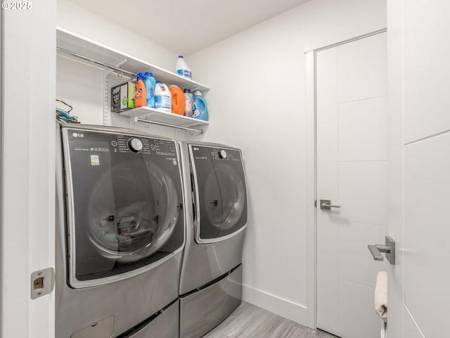 292 W Maple St, Washougal, WA 98671 - laundry room featuring separate washer and dryer and baseboards