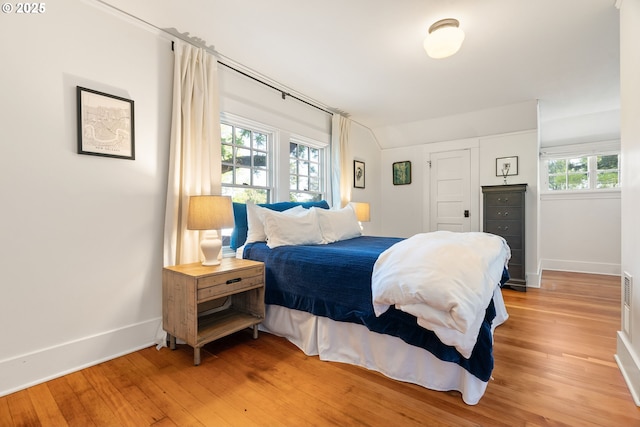 7985 SW Maple Dr, Portland, OR 97225 - bedroom featuring a closet, visible vents, a spacious closet, baseboards, and light wood-style floors