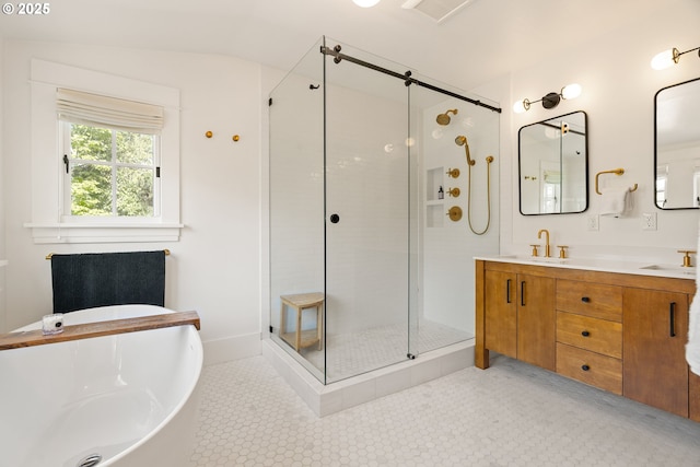 7985 SW Maple Dr, Portland, OR 97225 - full bathroom with double vanity, a stall shower, a sink, a freestanding bath, and visible vents