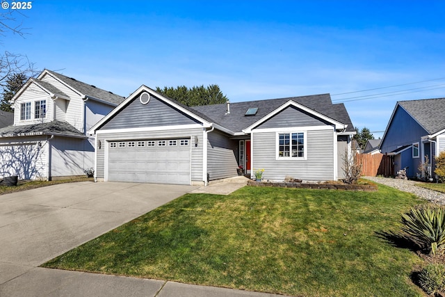 single story home with concrete driveway, fence, a garage, and a front yard