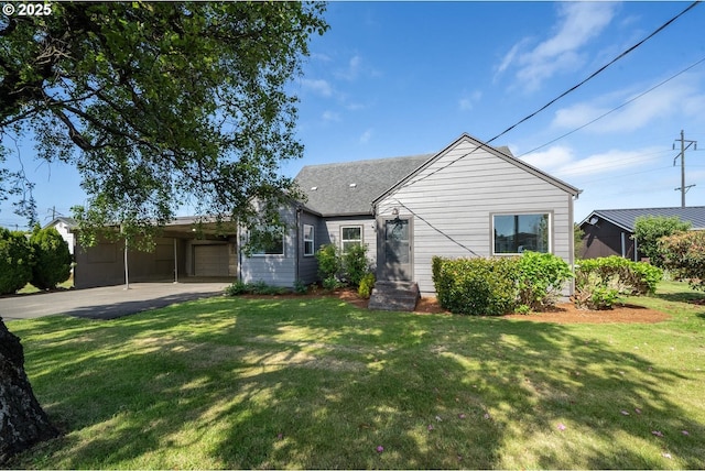 512 Evergreen Dr, Tillamook, OR 97141 - view of front of property with a front yard, an attached carport, driveway, and a shingled roof