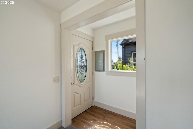 512 Evergreen Dr, Tillamook, OR 97141 - entrance foyer with wood finished floors, baseboards, and electric panel