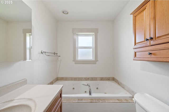512 Evergreen Dr, Tillamook, OR 97141 - bathroom with toilet, a whirlpool tub, and vanity