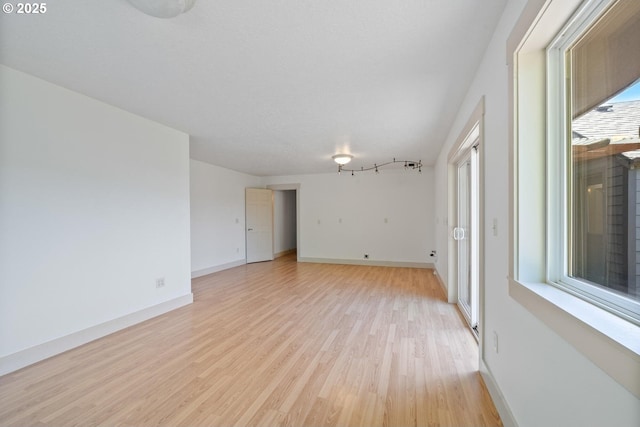 512 Evergreen Dr, Tillamook, OR 97141 - unfurnished room featuring light wood-style floors and baseboards