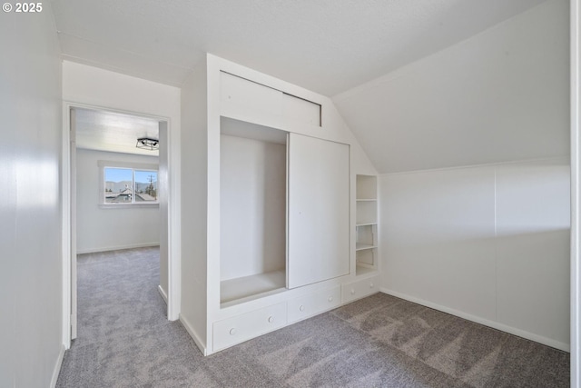 512 Evergreen Dr, Tillamook, OR 97141 - interior space featuring carpet flooring and vaulted ceiling