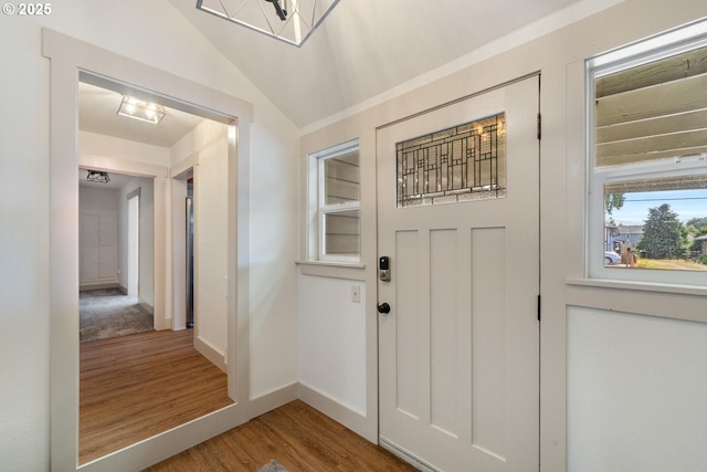 512 Evergreen Dr, Tillamook, OR 97141 - foyer entrance featuring wood finished floors, baseboards, and lofted ceiling